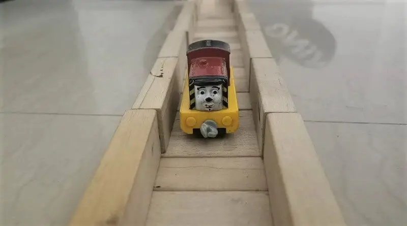toy train with wooden track